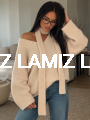 Przytulny portret w kremowym swetrze.png